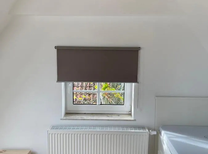 度假居 Familienhaus Am Nessmersiel 多努姆